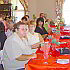 Business Men and Women listen attentively to Jan van Rooyen